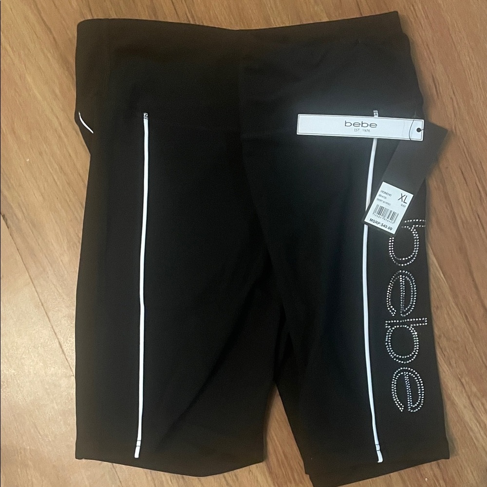 Bebe Black Shorts with White Detailing bling on sides comes with matching shirt